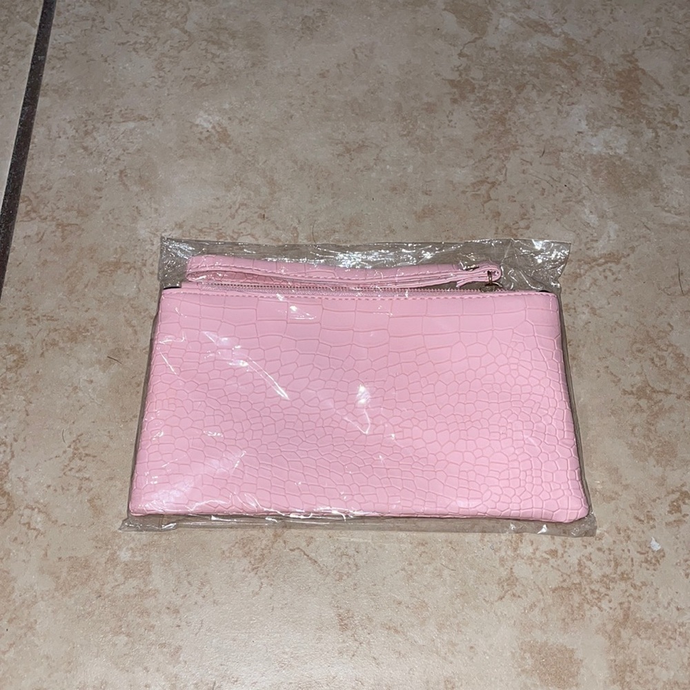 Pink snakeskin wristlet